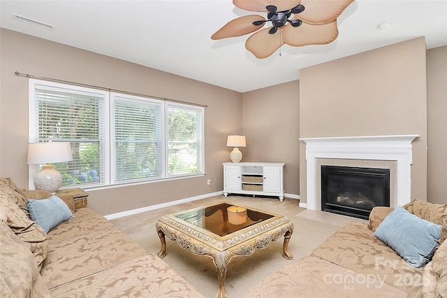1817 Tradd Ave, Clover, SC 29710 - living area featuring baseboards, ceiling fan, a fireplace with flush hearth, and light carpet