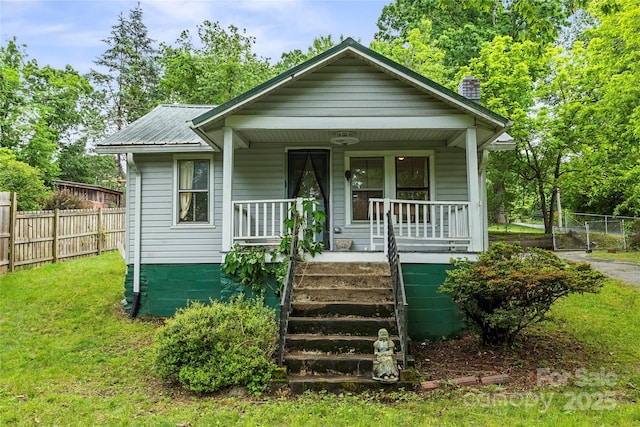 220 W College St, Black Mountain, NC 28711 - bungalow-style house featuring a porch and a chimney
