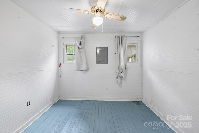 220 W College St, Black Mountain, NC 28711 - empty room with electric panel, hardwood / wood-style flooring, and a ceiling fan