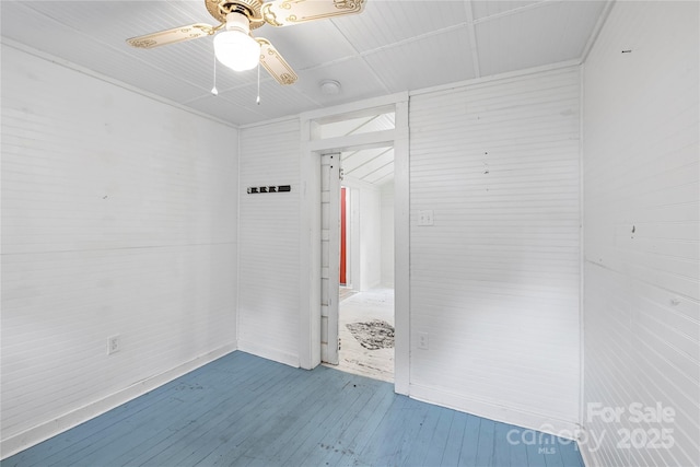 220 W College St, Black Mountain, NC 28711 - unfurnished bedroom featuring hardwood / wood-style floors and ceiling fan