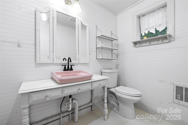 220 W College St, Black Mountain, NC 28711 - bathroom featuring vanity and heating unit