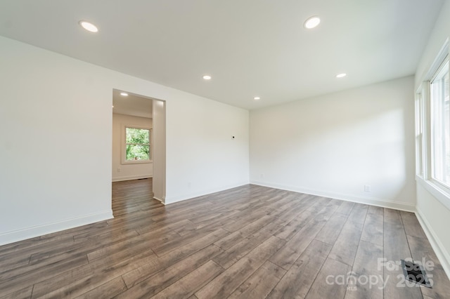 3608 Crestridge Dr, Charlotte, NC 28217 - empty room with wood finished floors, recessed lighting, and baseboards