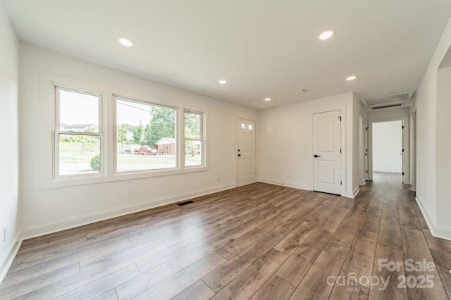3608 Crestridge Dr, Charlotte, NC 28217 - entrance foyer featuring wood finished floors, baseboards, and recessed lighting