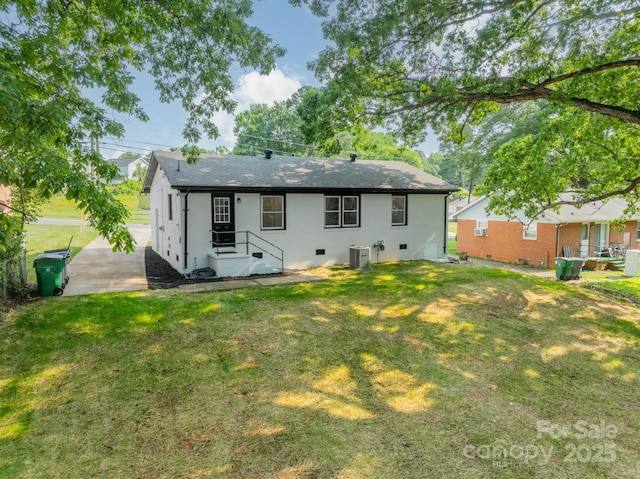 3608 Crestridge Dr, Charlotte, NC 28217 - back of property featuring cooling unit, a lawn, and a shingled roof