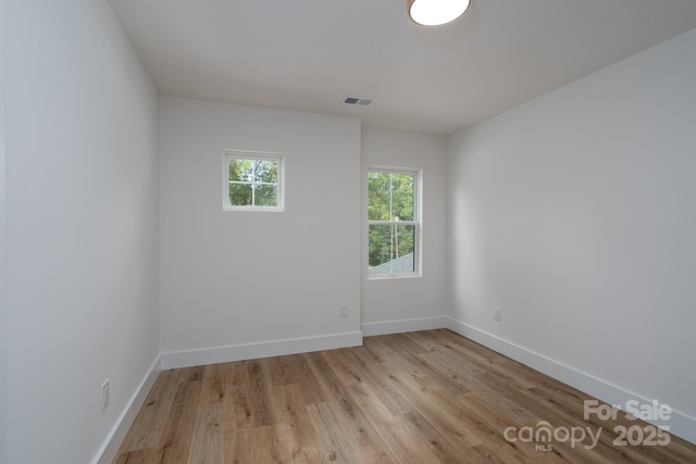 1520 Enochville Rd, Kannapolis, NC 28081 - empty room with light wood-type flooring and baseboards