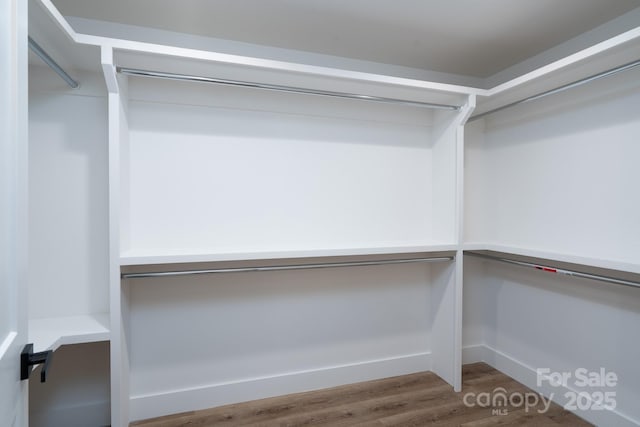 1520 Enochville Rd, Kannapolis, NC 28081 - walk in closet featuring wood finished floors
