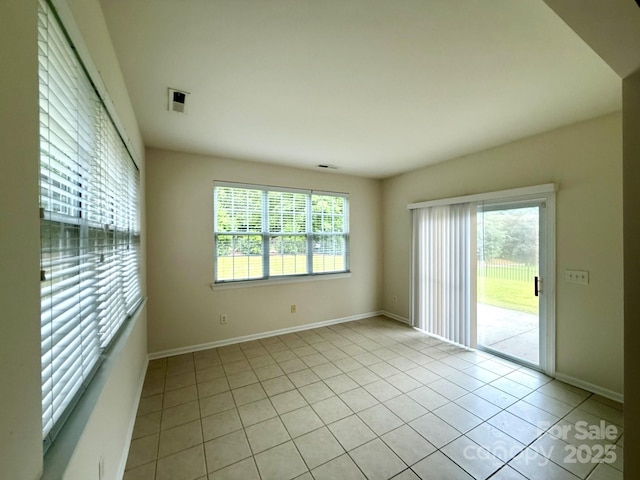 1304 Ridge Haven Rd, Waxhaw, NC 28173 - spare room with light tile patterned floors and baseboards
