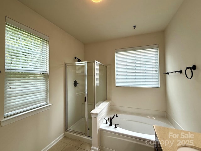 1304 Ridge Haven Rd, Waxhaw, NC 28173 - bathroom featuring a bath, a shower stall, vanity, and tile patterned floors