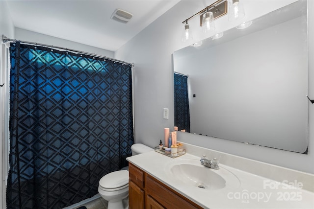 4006 Centerview Dr, Indian Trail, NC 28079 - bathroom featuring toilet, vanity, and a shower with curtain