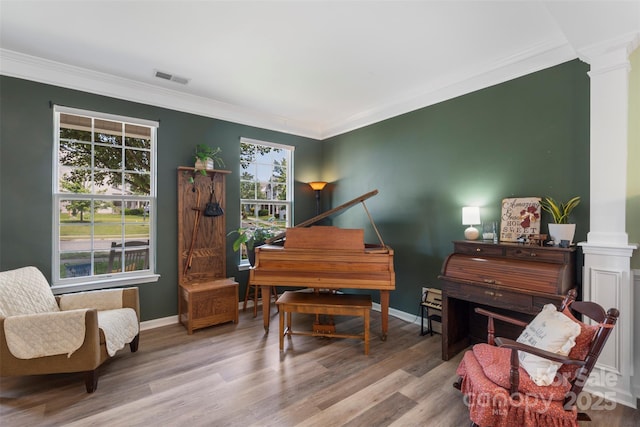 4006 Centerview Dr, Indian Trail, NC 28079 - living area featuring decorative columns, ornamental molding, wood finished floors, and baseboards