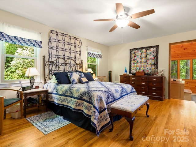 2981 Heath Peak Rd, Waynesville, NC 28785 - bedroom with wood finished floors and ceiling fan