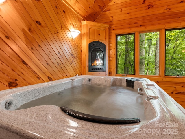 2981 Heath Peak Rd, Waynesville, NC 28785 - detailed view of a hot tub, wooden walls, and wooden ceiling