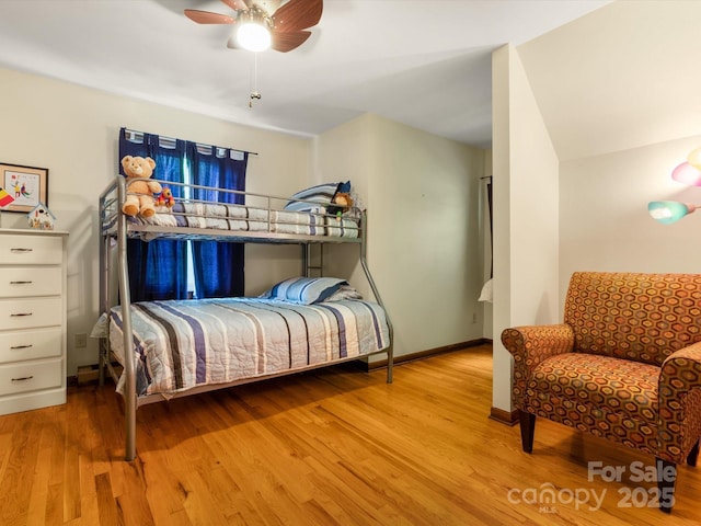 2981 Heath Peak Rd, Waynesville, NC 28785 - bedroom with wood finished floors and ceiling fan