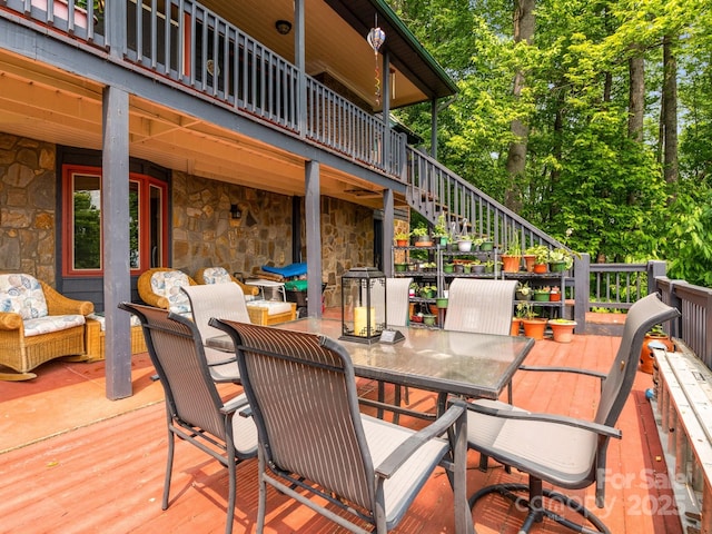 2981 Heath Peak Rd, Waynesville, NC 28785 - wooden deck with stairs, outdoor dining space, and an outdoor living space
