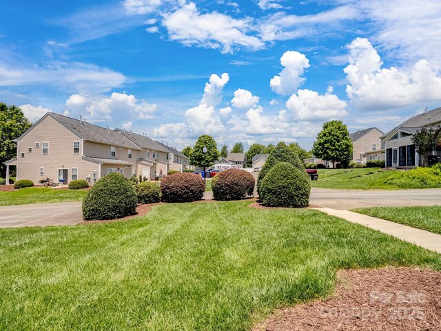10446 Trolley Run Dr, Cornelius, NC 28031 - view of green lawn with a residential view
