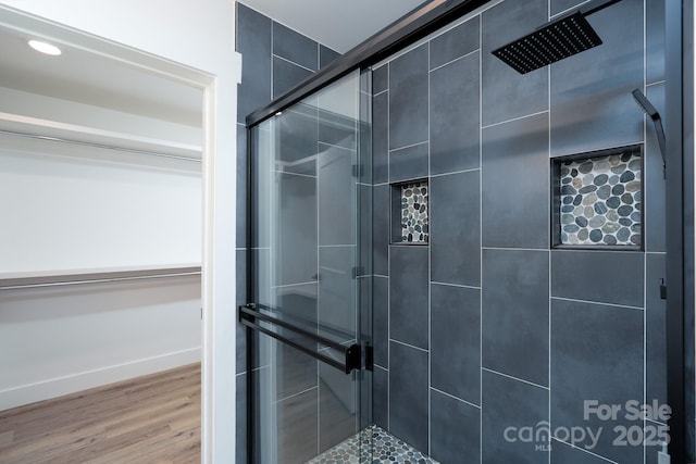 1524 Enochville Rd, Kannapolis, NC 28081 - bathroom featuring a shower stall, wood finished floors, baseboards, and recessed lighting