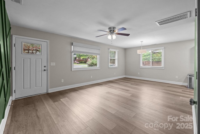 5008 Unaka Ave, Charlotte, NC 28205 - entrance foyer featuring a ceiling fan and wood finished floors