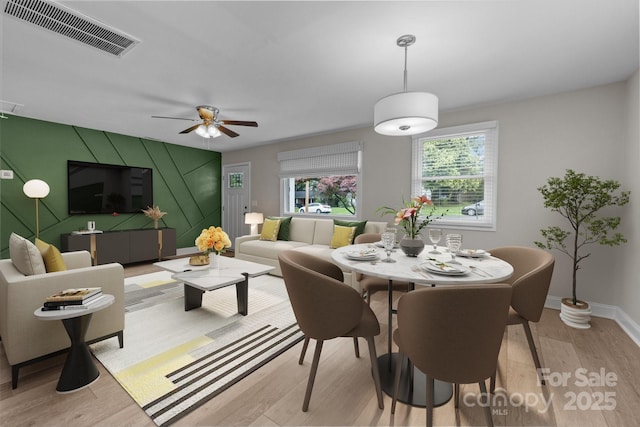 5008 Unaka Ave, Charlotte, NC 28205 - dining area featuring wood finished floors and ceiling fan