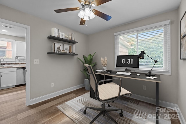 5008 Unaka Ave, Charlotte, NC 28205 - office featuring light wood-style flooring and ceiling fan