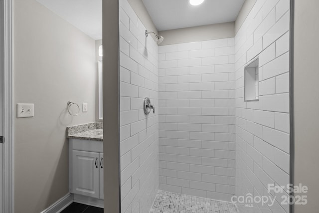 5008 Unaka Ave, Charlotte, NC 28205 - full bath featuring a tile shower and vanity