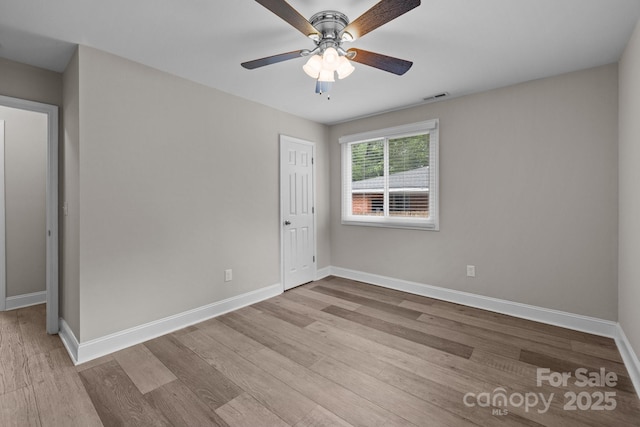 5008 Unaka Ave, Charlotte, NC 28205 - spare room featuring wood finished floors and a ceiling fan