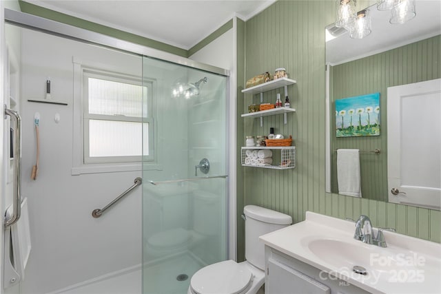 10 Poplar St, Waynesville, NC 28786 - bathroom featuring crown molding, a stall shower, toilet, and vanity