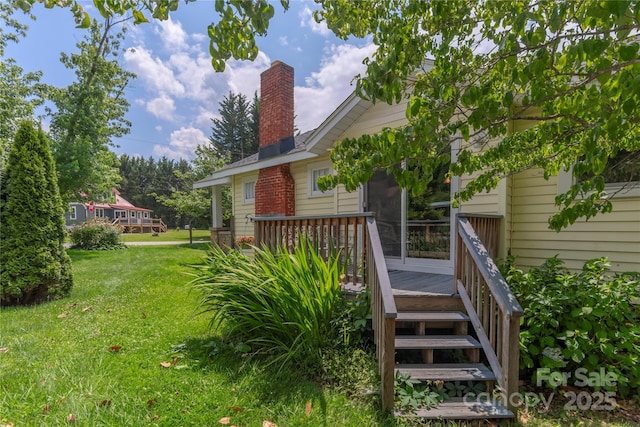 10 Poplar St, Waynesville, NC 28786 - view of grassy yard featuring a deck