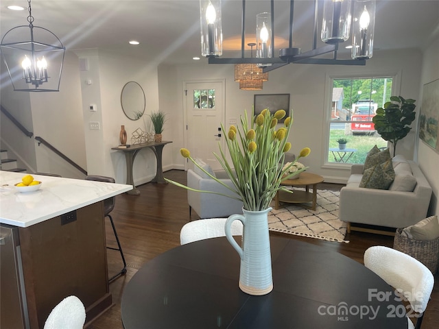 5840 Charing Pl, Charlotte, NC 28211 - dining space featuring a chandelier, dark wood-style floors, recessed lighting, and stairway