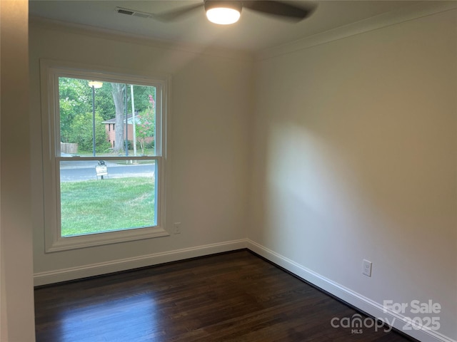 5840 Charing Pl, Charlotte, NC 28211 - unfurnished room with ceiling fan, ornamental molding, and dark wood-style flooring