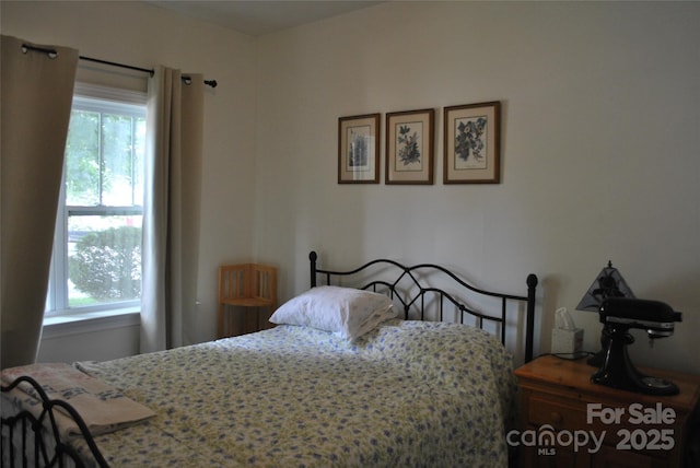 20 Foxden Dr Unit 203, Fletcher, NC 28732 - bedroom featuring multiple windows