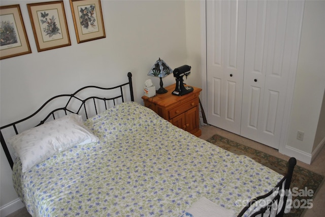 20 Foxden Dr Unit 203, Fletcher, NC 28732 - bedroom with baseboards and a closet
