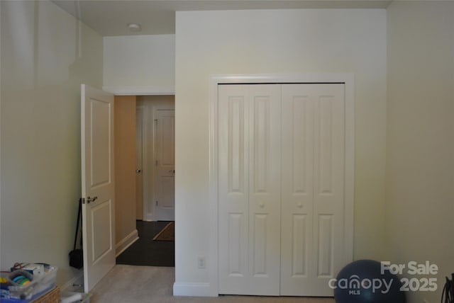 20 Foxden Dr Unit 203, Fletcher, NC 28732 - unfurnished bedroom with a closet, carpet flooring, and baseboards