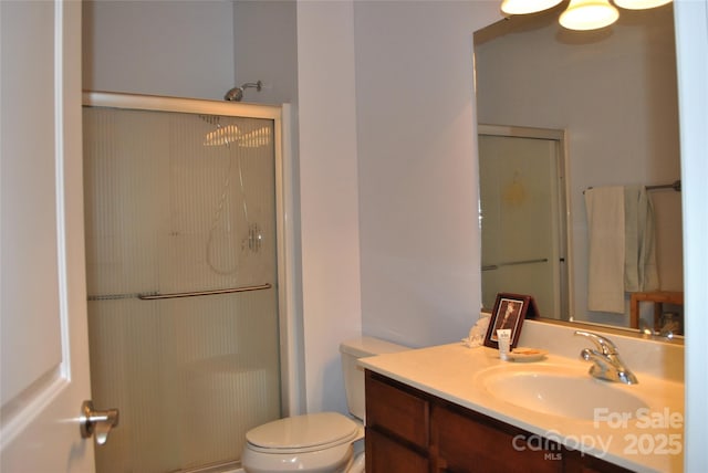 20 Foxden Dr Unit 203, Fletcher, NC 28732 - bathroom with vanity, a shower stall, and toilet