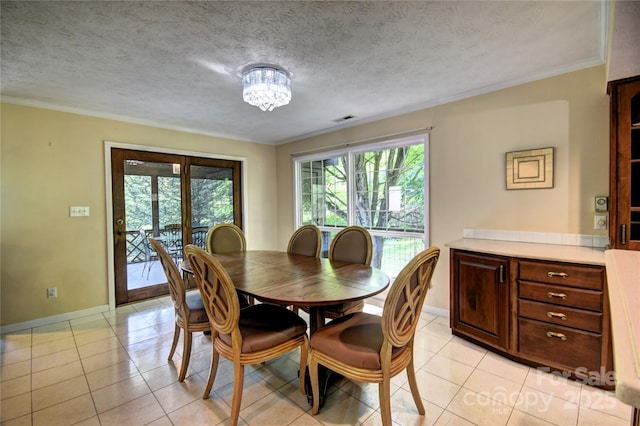 41 Balsam Shadows Rd, Maggie Valley, NC 28751 - dining area featuring baseboards, light tile patterned flooring, crown molding, and a chandelier