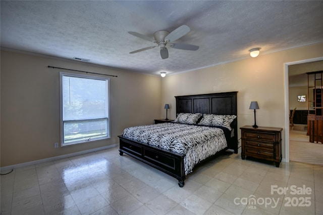 41 Balsam Shadows Rd, Maggie Valley, NC 28751 - bedroom with baseboards, a textured ceiling, crown molding, and ceiling fan