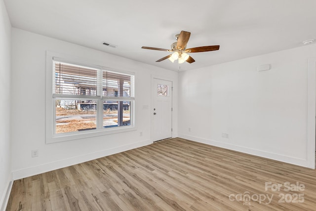 81 Kirk St, Salisbury, NC 28144 - empty room with light wood-style flooring, a ceiling fan, baseboards, and a smoke detector