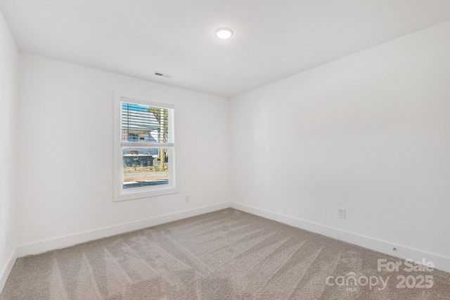 81 Kirk St, Salisbury, NC 28144 - spare room featuring carpet floors and baseboards