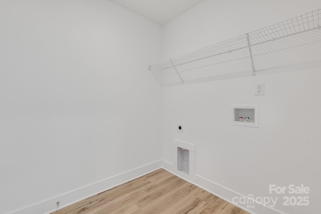 81 Kirk St, Salisbury, NC 28144 - laundry area featuring hookup for a washing machine, hookup for an electric dryer, light wood-style floors, and baseboards