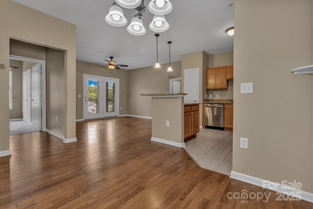 234 Brickton Village Cir Unit 201, Fletcher, NC 28732 - kitchen with dishwasher, ceiling fan, light wood finished floors, open floor plan, and a chandelier