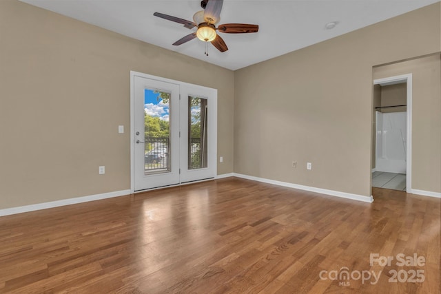 234 Brickton Village Cir Unit 201, Fletcher, NC 28732 - spare room with a ceiling fan and wood finished floors