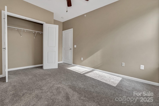234 Brickton Village Cir Unit 201, Fletcher, NC 28732 - unfurnished bedroom featuring carpet flooring, a closet, and a ceiling fan