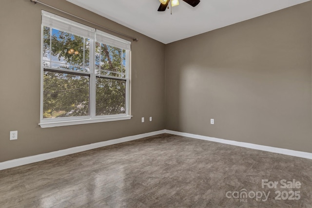 234 Brickton Village Cir Unit 201, Fletcher, NC 28732 - spare room with a ceiling fan and baseboards
