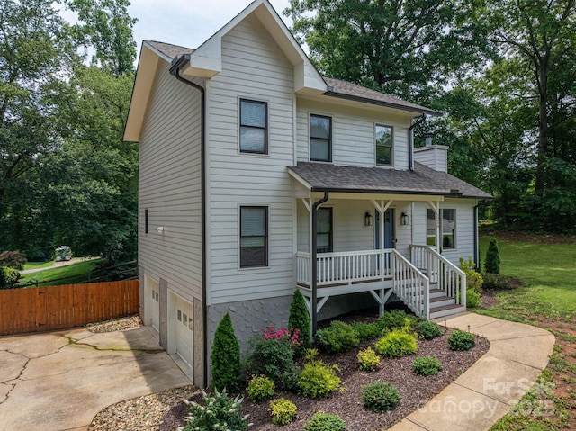 1256 Canseco Ln, Hickory, NC 28602 - view of front facade featuring a porch, concrete driveway, an attached garage, and a shingled roof
