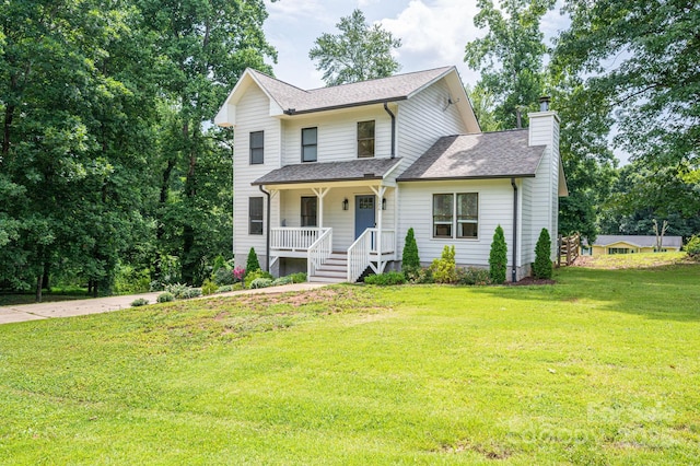 1256 Canseco Ln, Hickory, NC 28602 - traditional home featuring covered porch, a chimney, a front yard, and a shingled roof