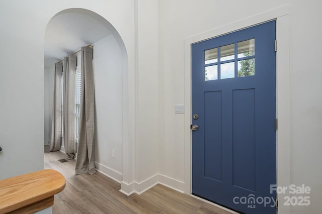 1256 Canseco Ln, Hickory, NC 28602 - entryway with wood finished floors and arched walkways