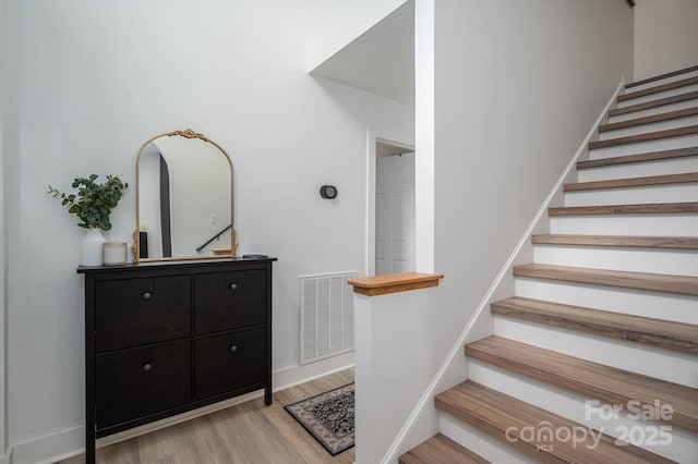 1256 Canseco Ln, Hickory, NC 28602 - stairs with wood finished floors and baseboards
