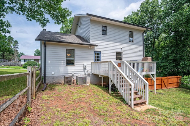 1256 Canseco Ln, Hickory, NC 28602 - rear view of house with a deck, a fenced backyard, stairway, and roof with shingles