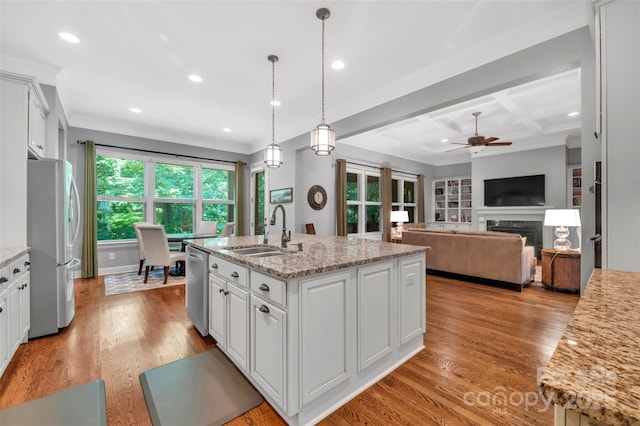 1600 Buckland Ct, Indian Land, SC 29707 - kitchen featuring appliances with stainless steel finishes, ceiling fan, light wood-style flooring, white cabinetry, and recessed lighting