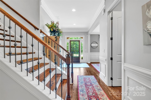 1600 Buckland Ct, Indian Land, SC 29707 - foyer entrance featuring crown molding, wainscoting, wood finished floors, recessed lighting, and a decorative wall