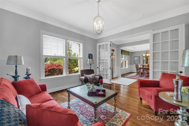 1600 Buckland Ct, Indian Land, SC 29707 - living area with a chandelier, healthy amount of natural light, french doors, ornamental molding, and wood finished floors